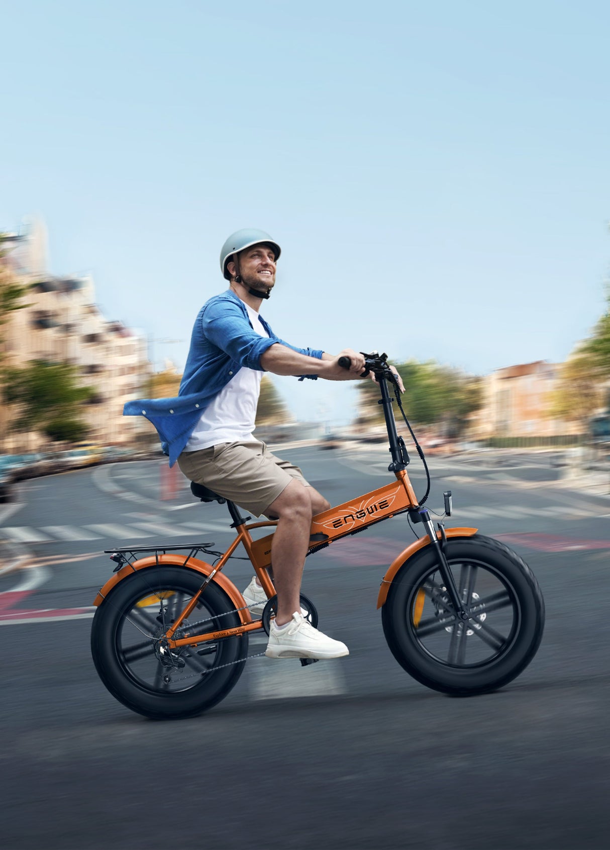 a man riding an orange engwe ep-2 boost folding e bike